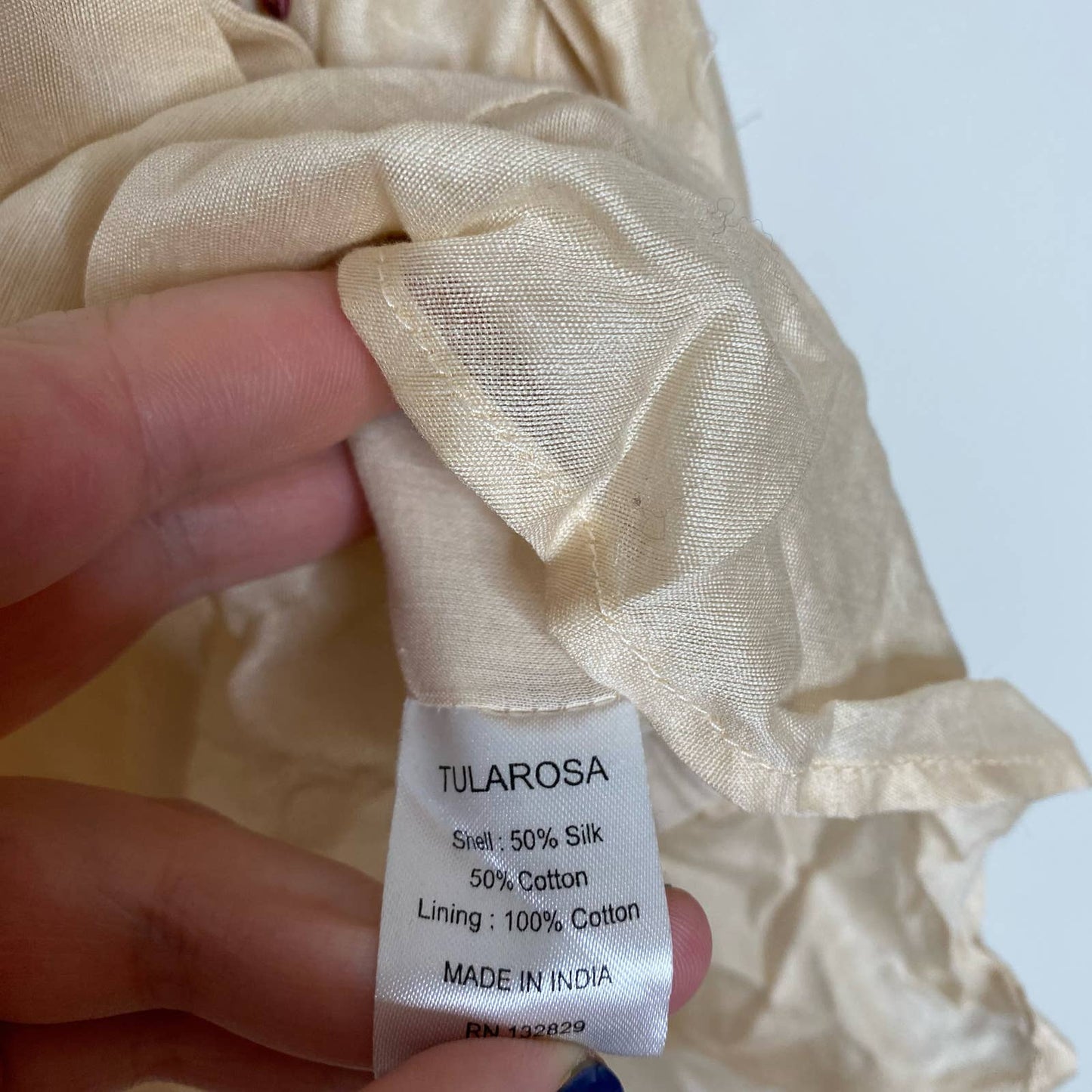 TULAROSA Ashby Floral Embroidered Faux Wrap Romper in Shell Size Small